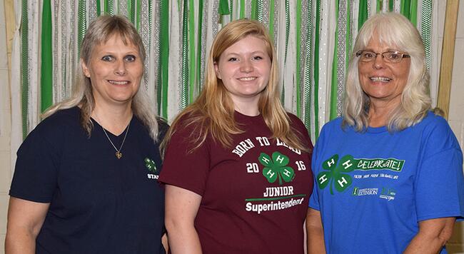three 4-H staff members in group photo