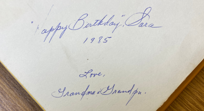 Handwritten message - Happy birthday Sara 1985 Love Grandma and Grandpa