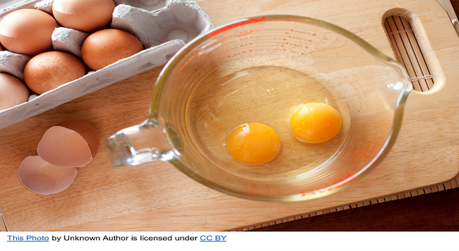 eggs in carton and mixing bowl 