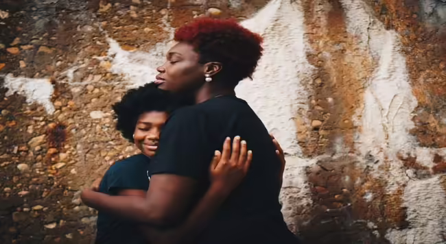 mother hugging her child