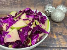 Bowl of red cabbage and green apple slaw