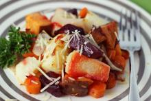 Close up of different roasted root vegetables