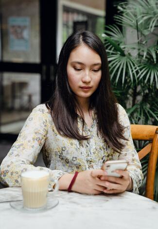 Woman looking at cell phone