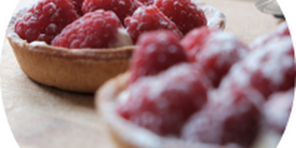 raspberry tarts on table