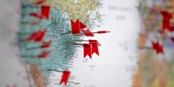 Map with red flags marking places