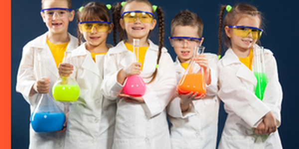 kids in lab coats holding flasks with colorful solutions in them