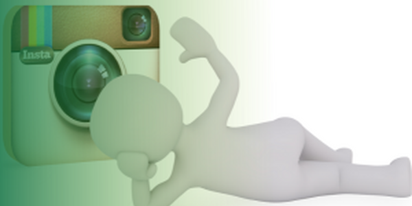 stick person laying in front of a insta camera