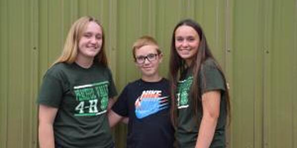 three 4-Hers in a group