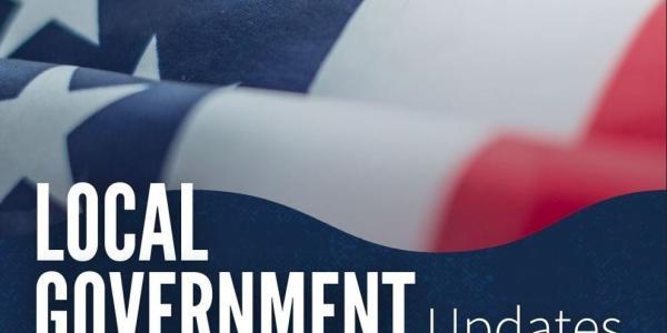 Local Government Updates with American Flag background