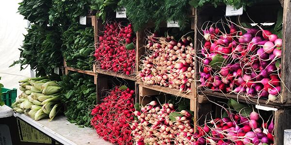 radishes and vegetables at farmers market