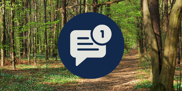 wooded area with navy blue with message symbol