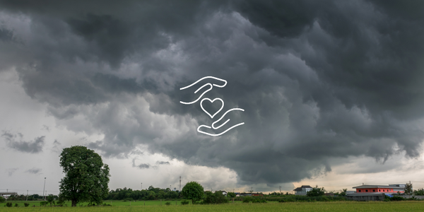 Storm clouds over a farm