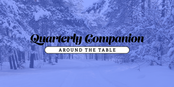 "Quarterly Companion: Around the Table" in a snowy forest