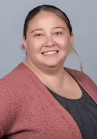 woman in orange sweater